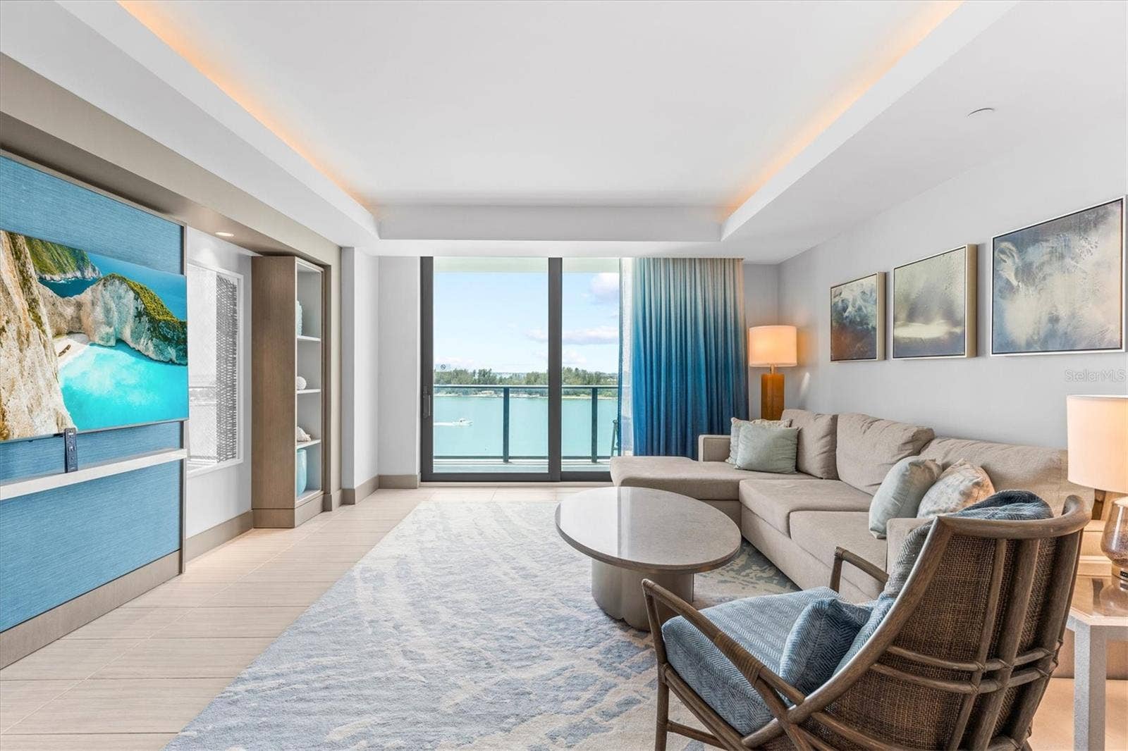 691 S GULFVIEW BOULEVARD, #815, Clearwater Beach, FL 33767 Living area with gorgeous views + pull-out sofa