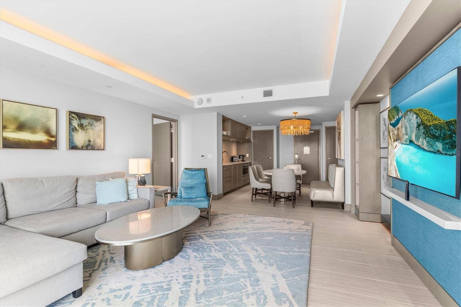 691 S GULFVIEW BOULEVARD, #815, Clearwater Beach, FL 33767 Living area with gorgeous views + pull-out sofa