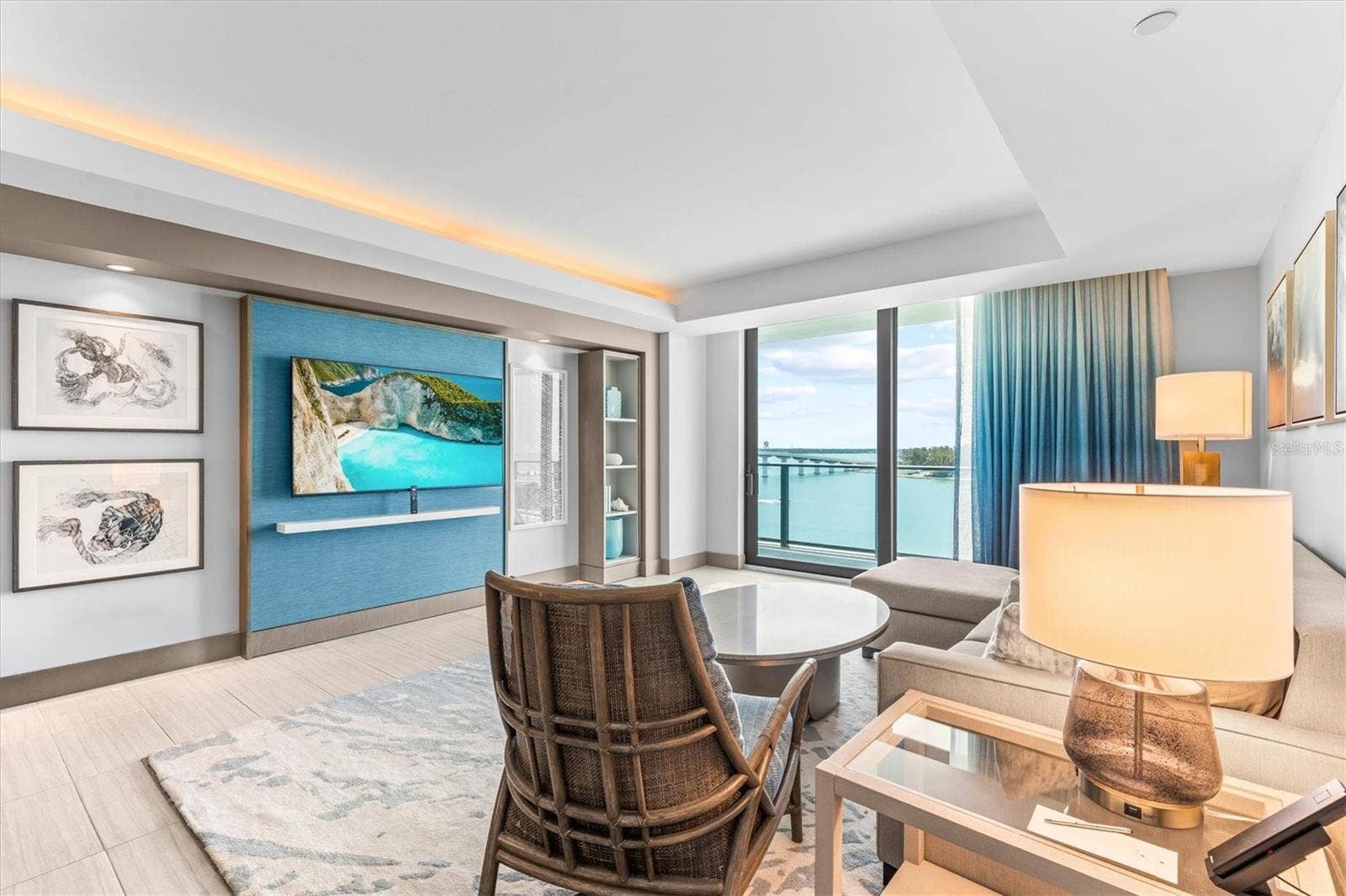 691 S GULFVIEW BOULEVARD, #815, Clearwater Beach, FL 33767 Living area with gorgeous views + pull-out sofa