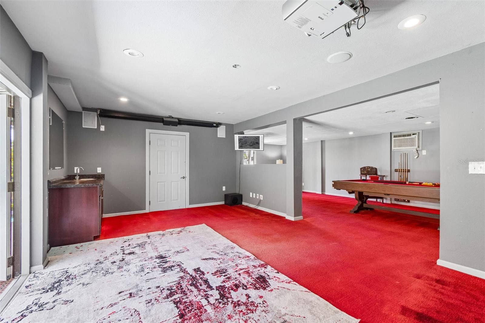 3141 N CANAL DRIVE, Palm Harbor, FL 34684 More imagination space. Wet bar and attached full bath.