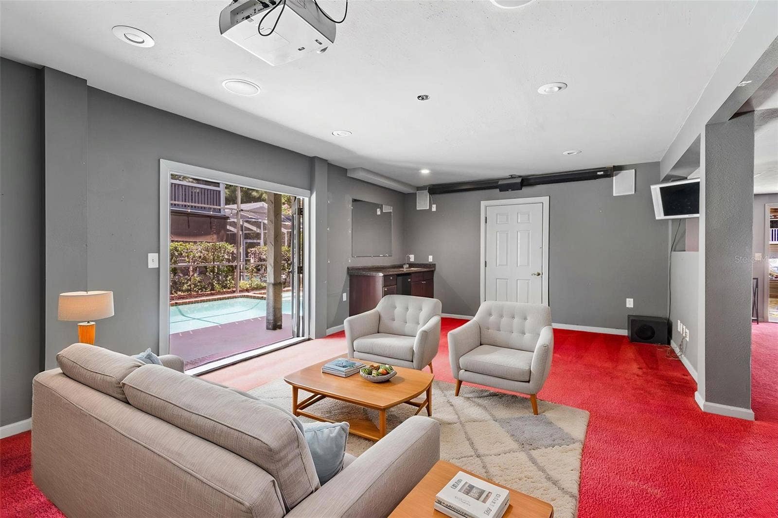 3141 N CANAL DRIVE, Palm Harbor, FL 34684 Downstairs flex space. Can be anything you imagine! Game room, media room, office, in-law or guest suite.