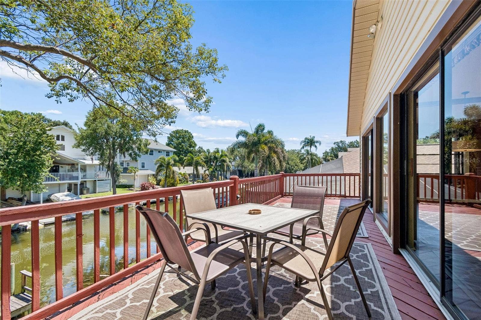 3141 N CANAL DRIVE, Palm Harbor, FL 34684 Enjoy your expansive balcomy with views of the lake.