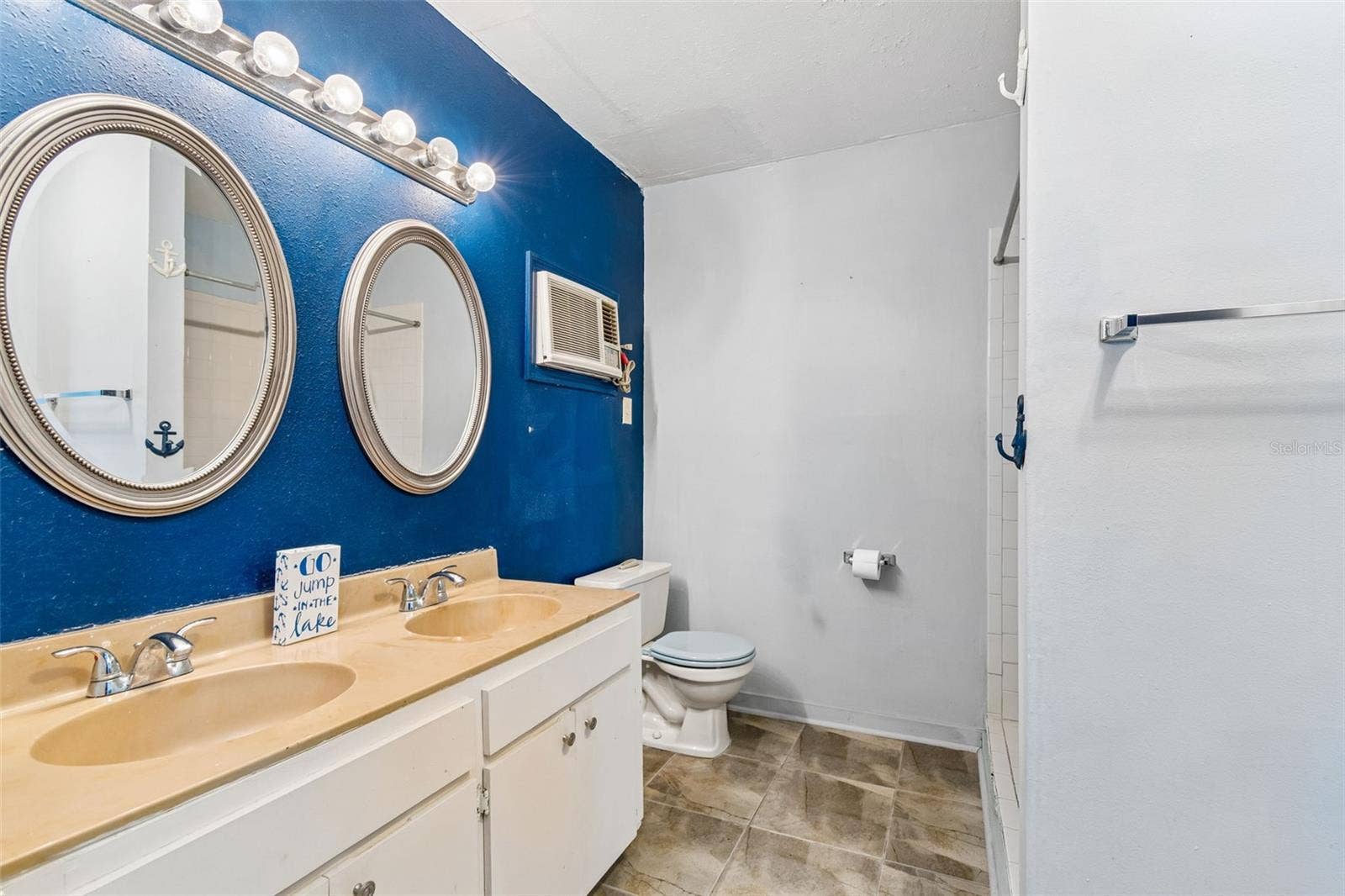 3141 N CANAL DRIVE, Palm Harbor, FL 34684 Bonus room full bath. Double sinks. Walk-in shower.