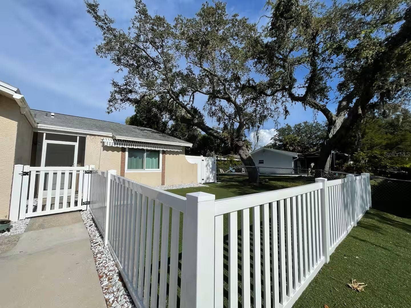 2107 GROVE VALLEY AVENUE, Palm Harbor, FL 34683 New fencing astro turf yard