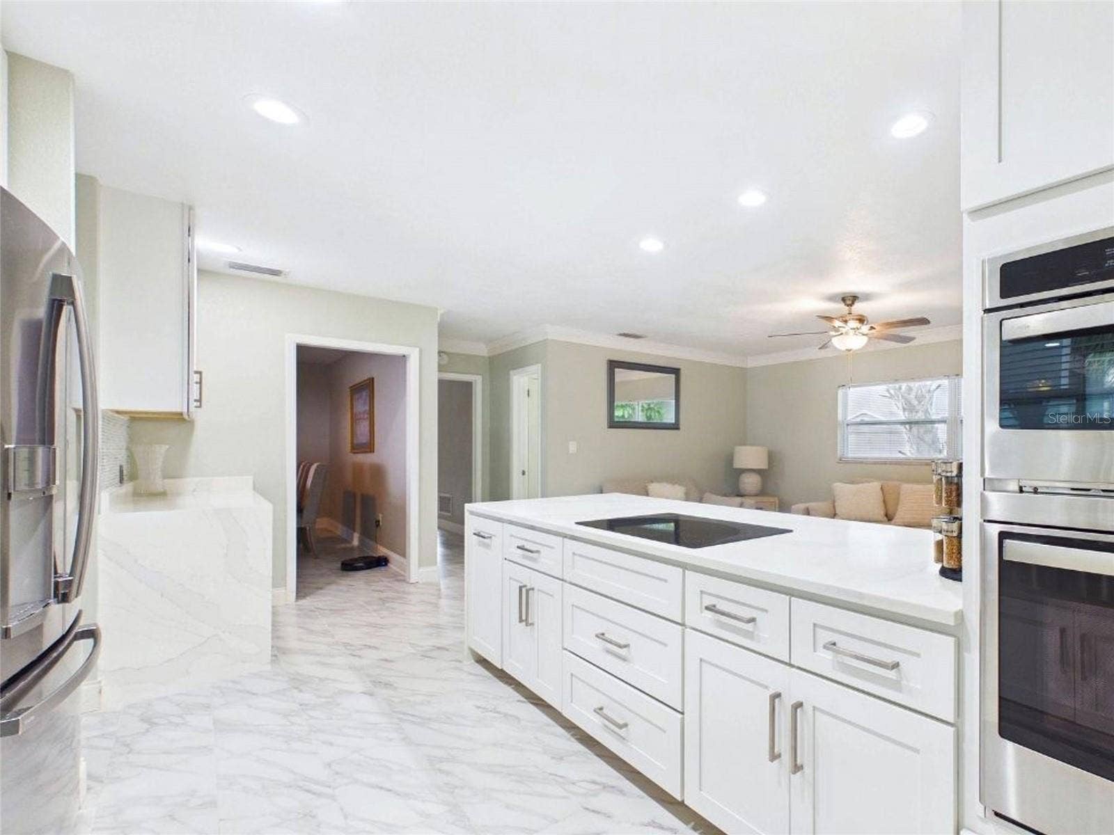 409 4TH AVENUE N, Tierra Verde, FL 33715 Open Kitchen with eat-in island