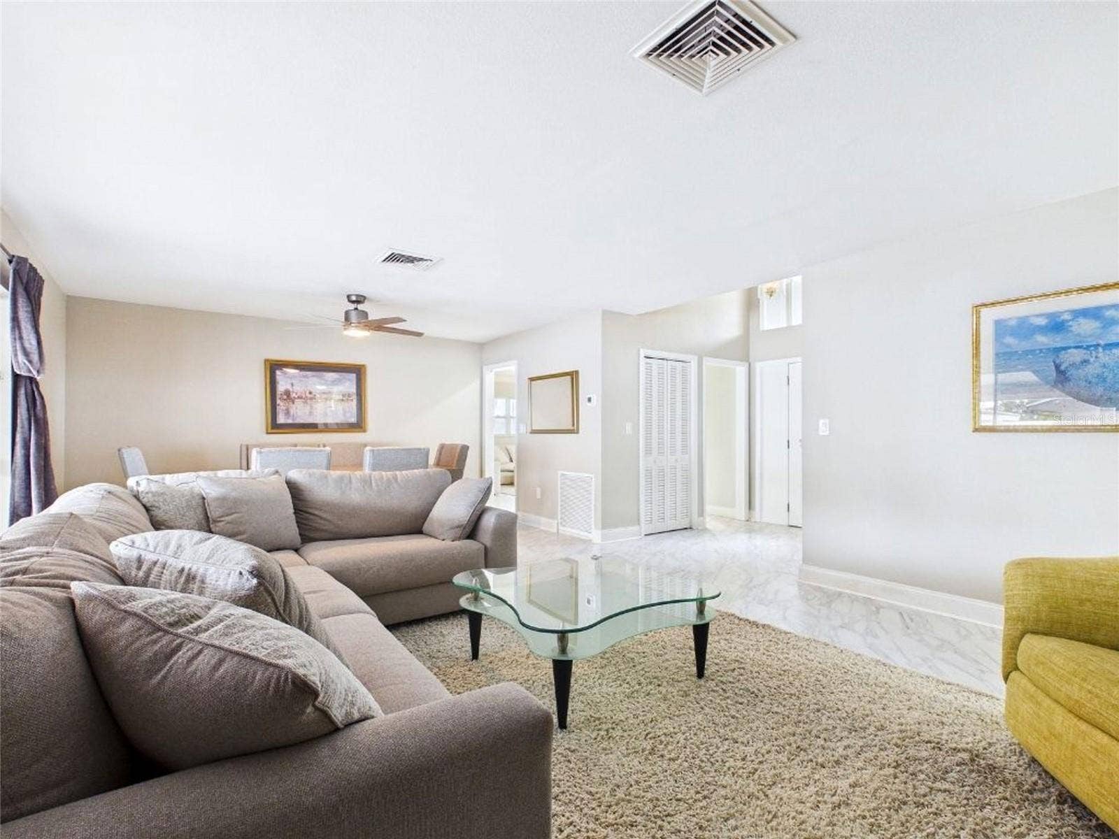 409 4TH AVENUE N, Tierra Verde, FL 33715 Large Family Room & Dining Room Combo