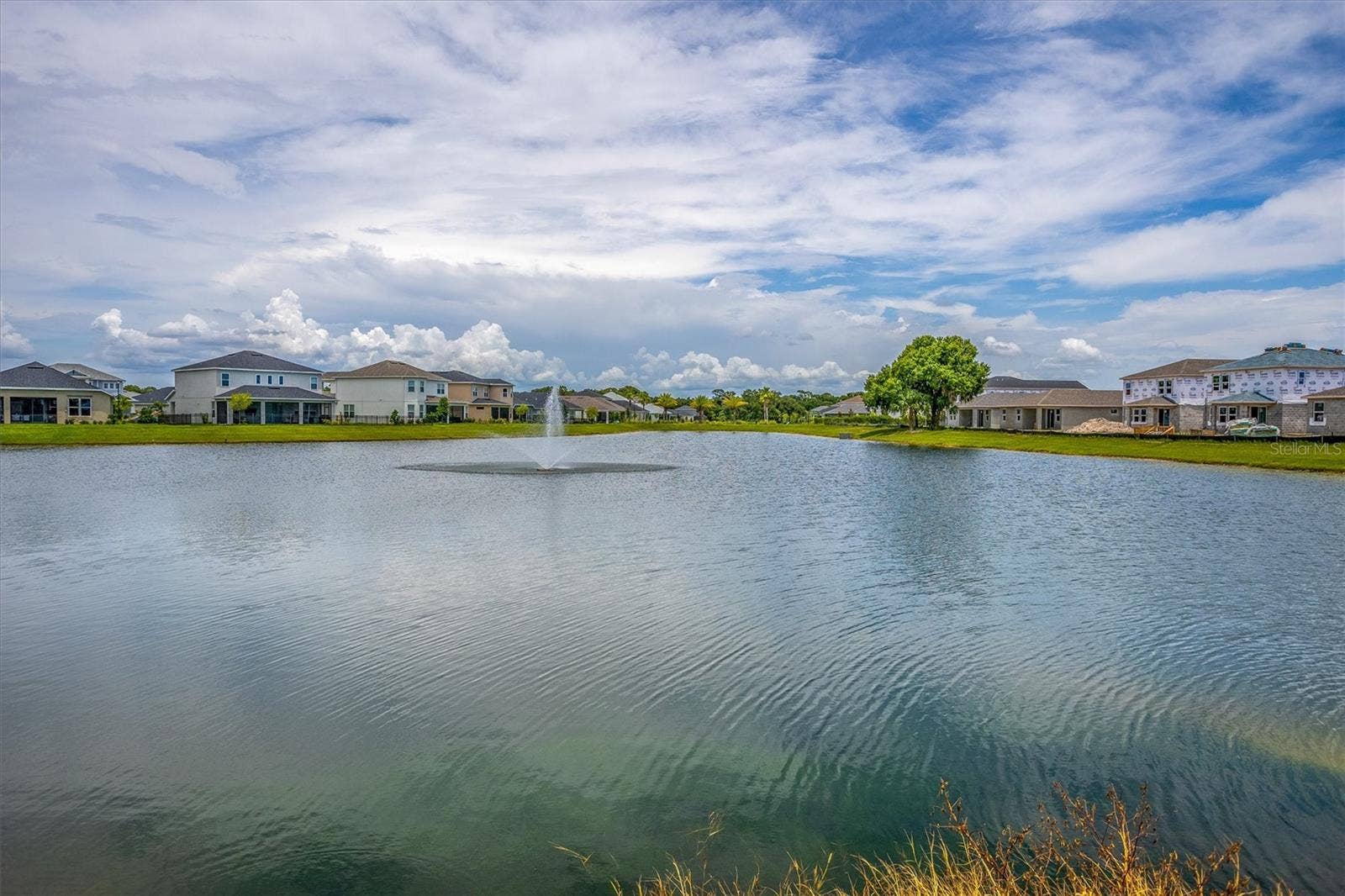 5718 LOS ROBLES COURT, Palmetto, FL 34221 Waterviews surround the community