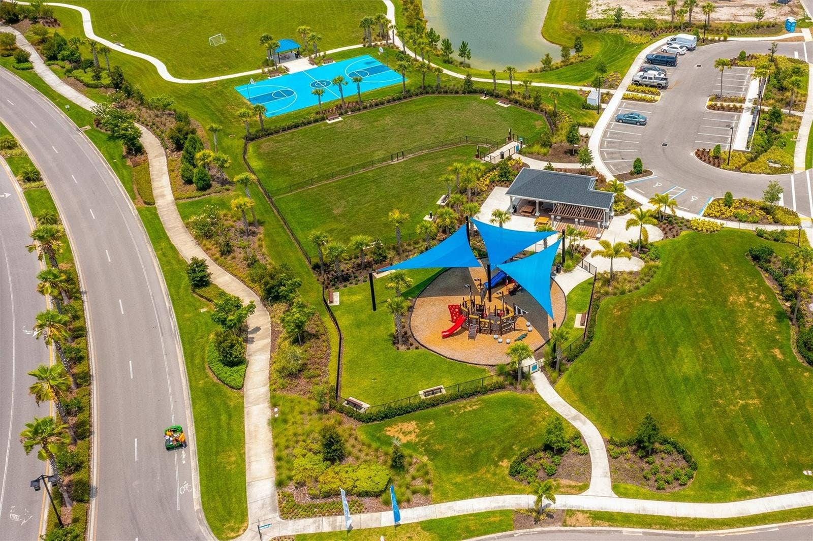 5718 LOS ROBLES COURT, Palmetto, FL 34221 Aerial View of Playground & Basketball Court