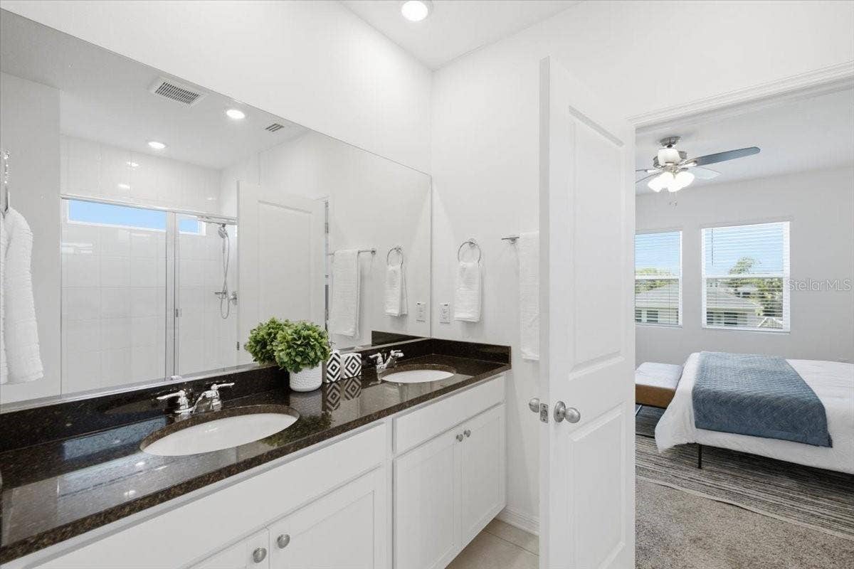 5718 LOS ROBLES COURT, Palmetto, FL 34221 En Suite Primary Bath w/ Walk-In Closet, Large Walk-In Shower, Dual Sinks, & Water Closet