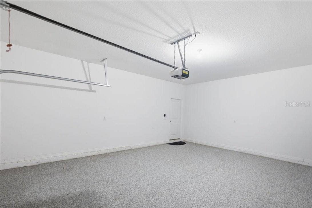 5718 LOS ROBLES COURT, Palmetto, FL 34221 Large 2-Car Garage w/ Epoxied floor