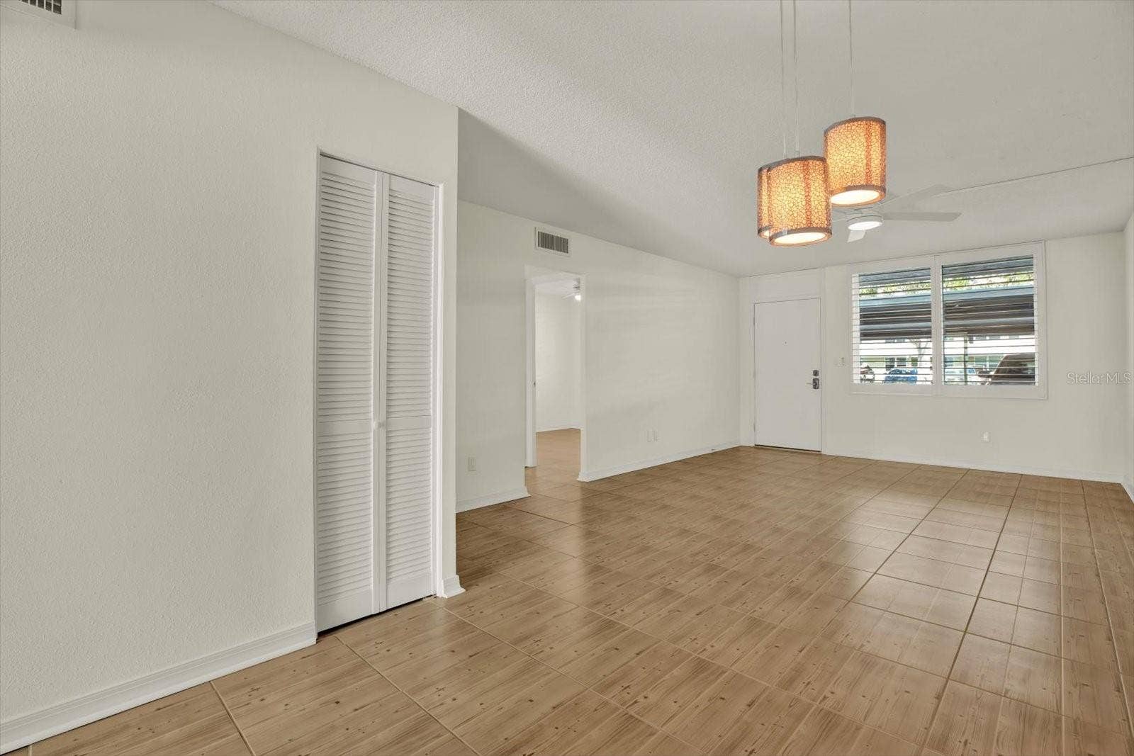 4715 BAY STREET NE, #126, St Petersburg, FL 33703 Living / Dining Area