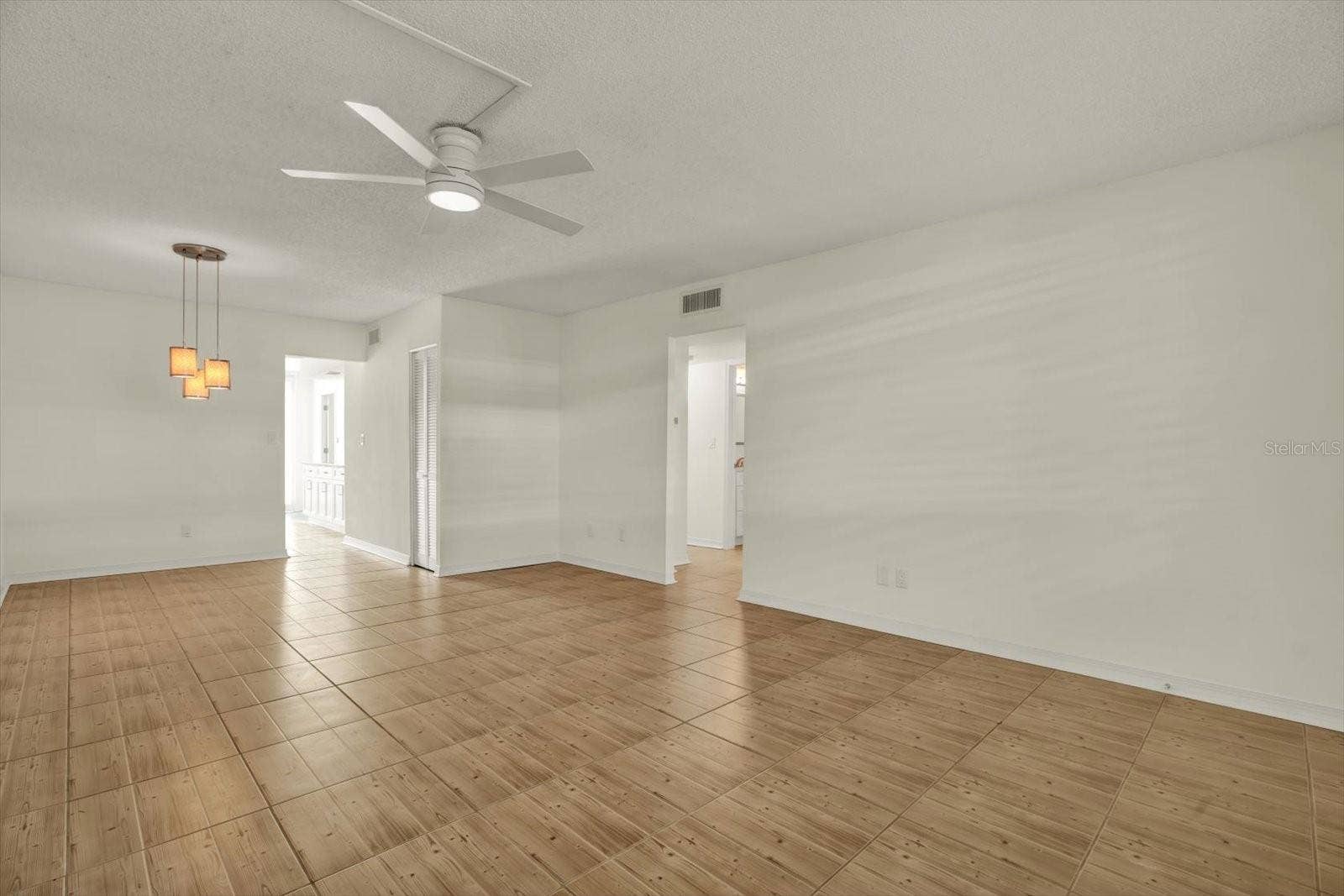 4715 BAY STREET NE, #126, St Petersburg, FL 33703 Living / Dining Area