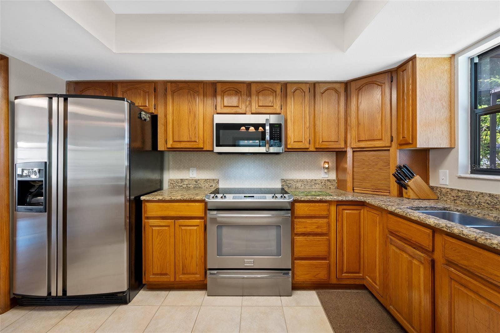 2409 OSPREY AVENUE, Palm Harbor, FL 34683 Solid wood cabinetry, granite countertops
