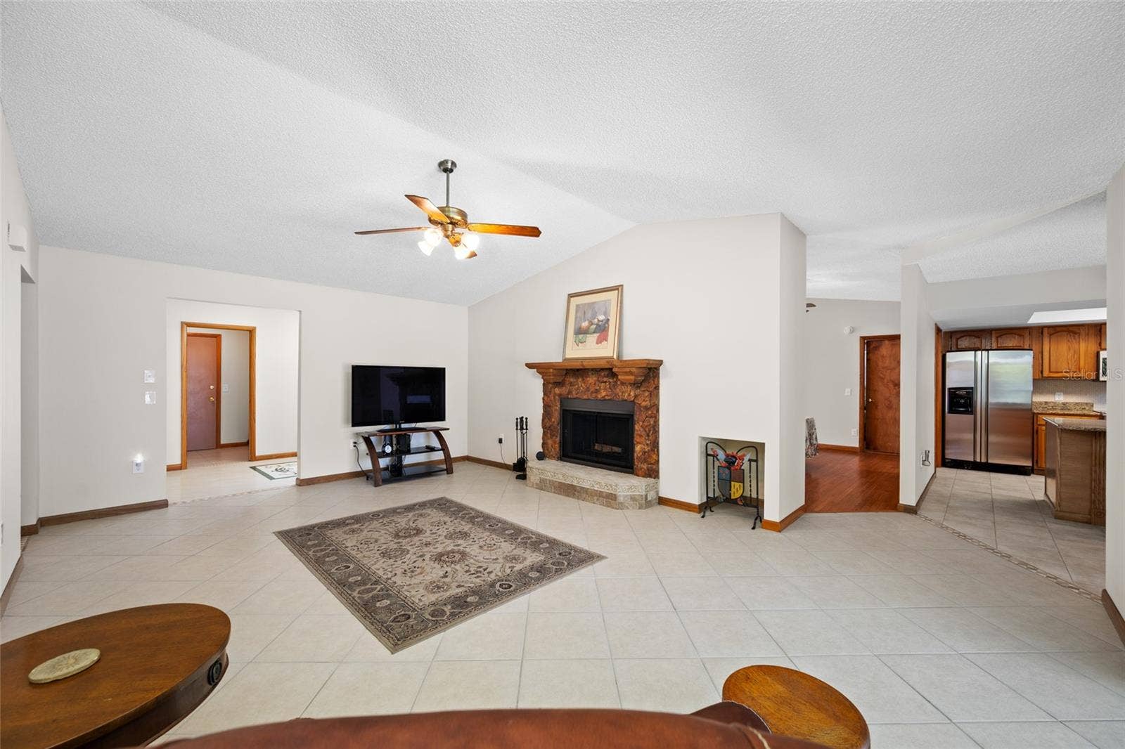 2409 OSPREY AVENUE, Palm Harbor, FL 34683 Family Room with wood burning fireplace