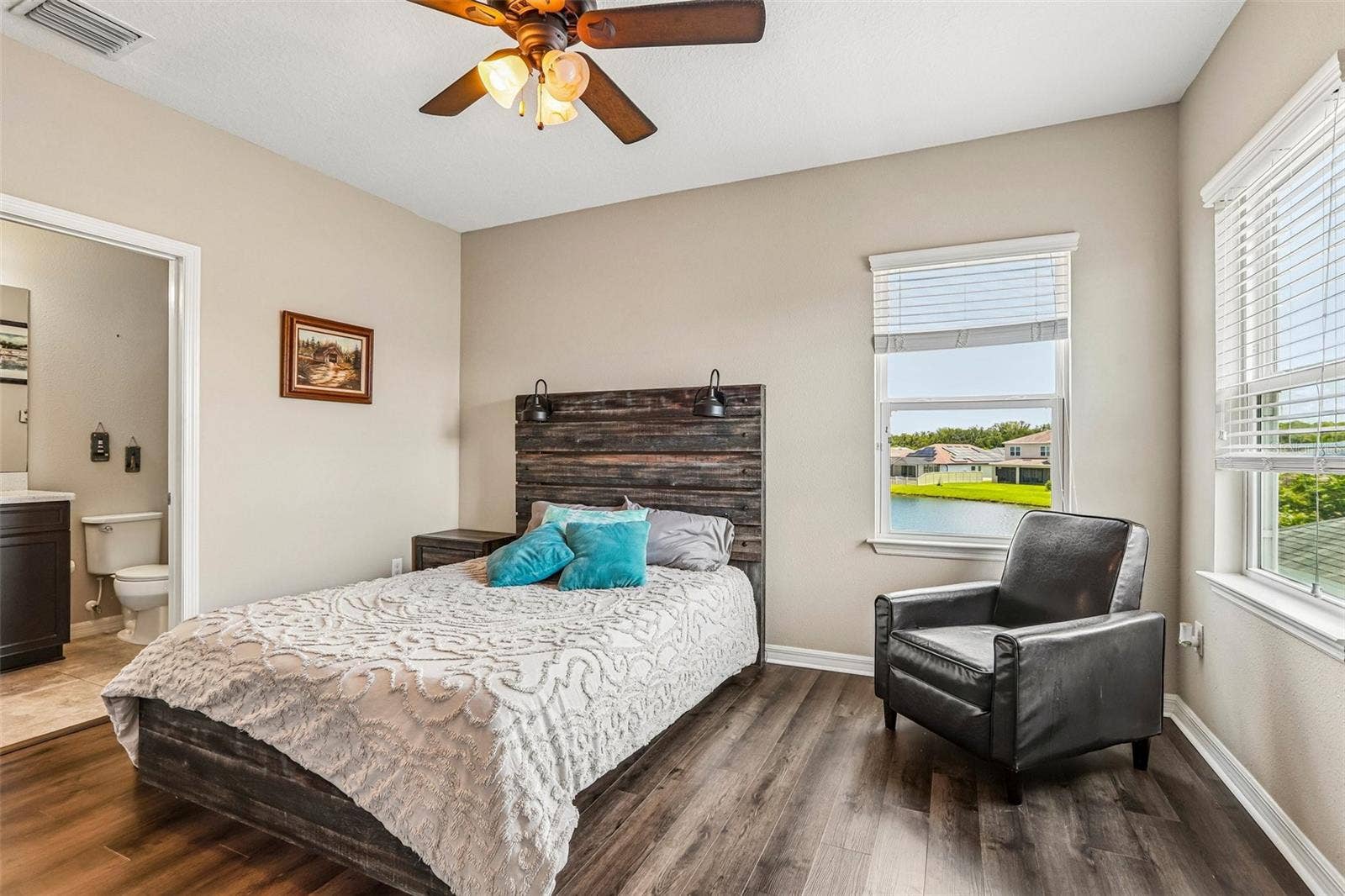 17628 BRIGHT WHEAT DRIVE, Lithia, FL 33547 Bedroom 4 with new laminate flooring, walk in closet and ensuite bathroom