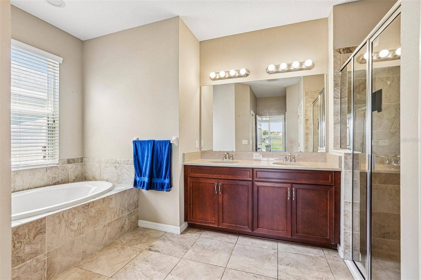 17628 BRIGHT WHEAT DRIVE, Lithia, FL 33547 Primary Bathroom with dual vanity, soaking tub, walk in shower and 2 walk in closets