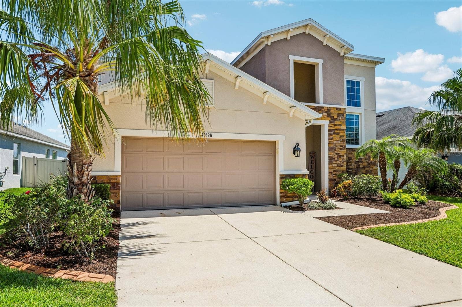 17628 BRIGHT WHEAT DRIVE, Lithia, FL 33547 Front view of the left side of the home