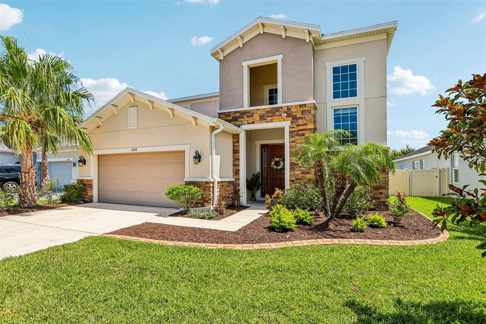 17628 BRIGHT WHEAT DRIVE, Lithia, FL 33547 Front view of the right side of the home