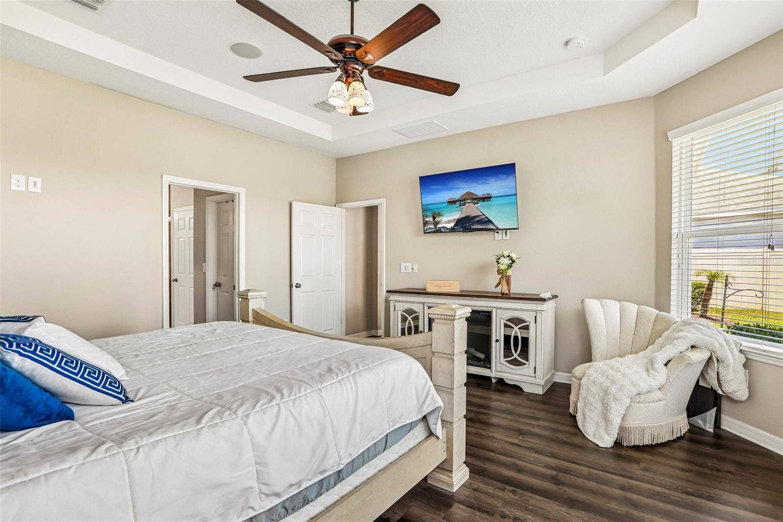 17628 BRIGHT WHEAT DRIVE, Lithia, FL 33547 Primary Bedroom with new laminate flooring, view to the back yard and pond
