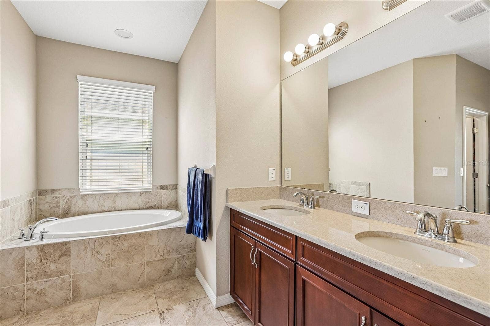 17628 BRIGHT WHEAT DRIVE, Lithia, FL 33547 Primary Bathroom with dual vanity, soaking tub, walk in shower and 2 walk in closets