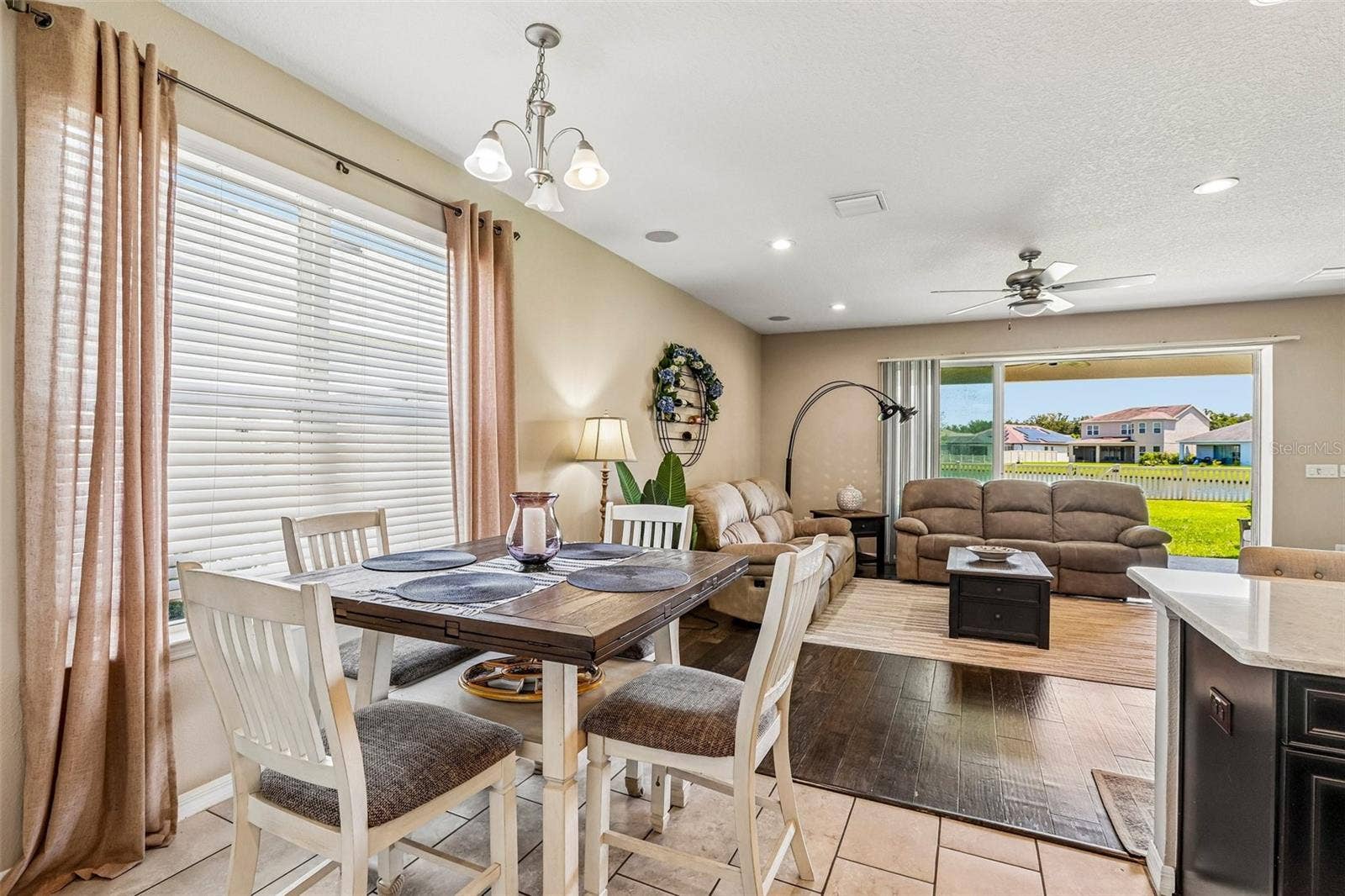 17628 BRIGHT WHEAT DRIVE, Lithia, FL 33547 Dinette area, off the kitchen, with open floor plan and view to back yard