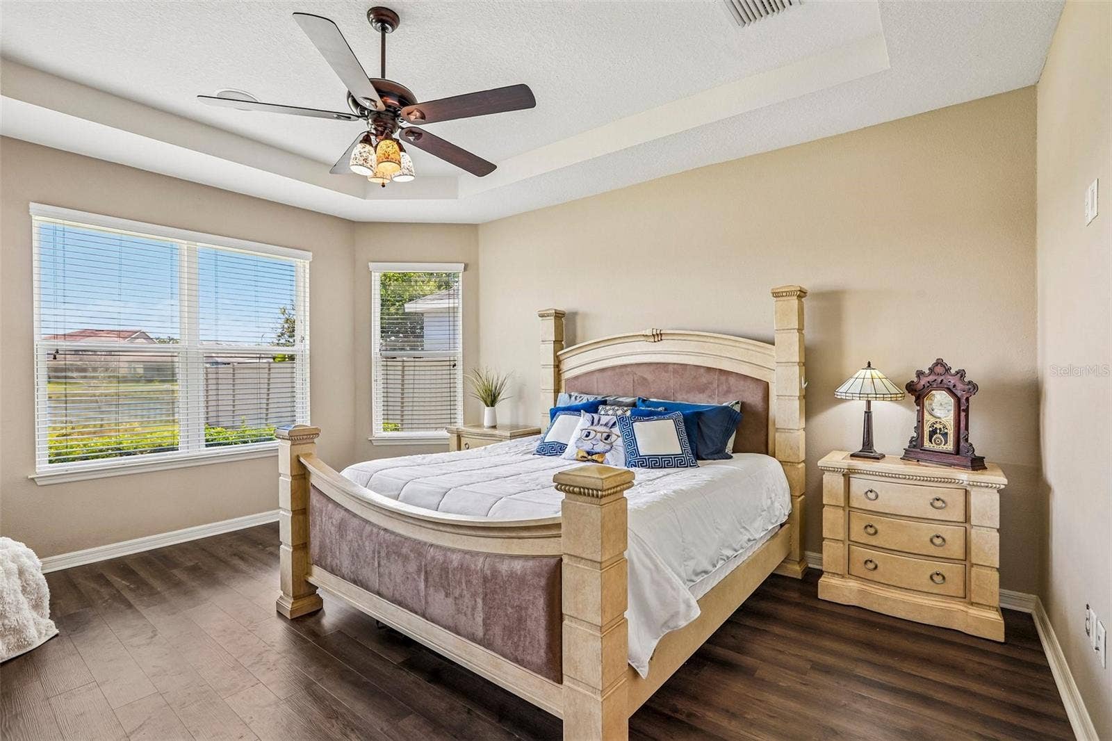 17628 BRIGHT WHEAT DRIVE, Lithia, FL 33547 Primary Bedroom with new laminate flooring, view to the back yard and pond