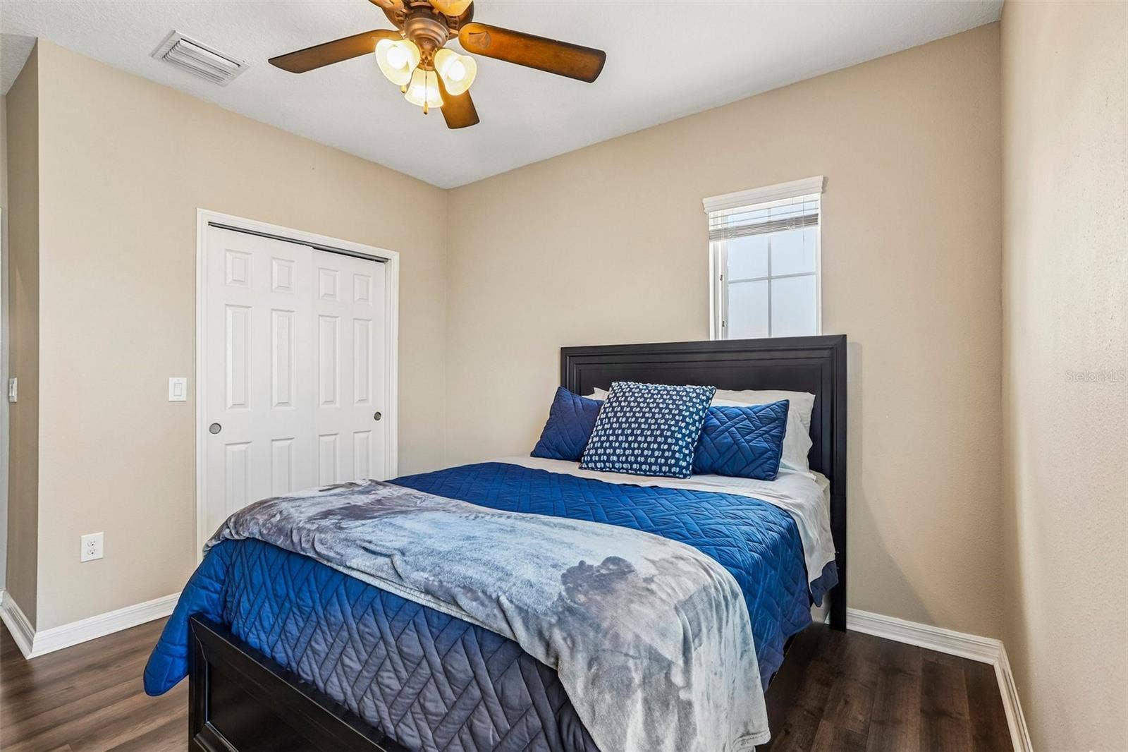 17628 BRIGHT WHEAT DRIVE, Lithia, FL 33547 Bedroom 2 with laminate new laminate flooring, large closet and access to jack and jill bathroom