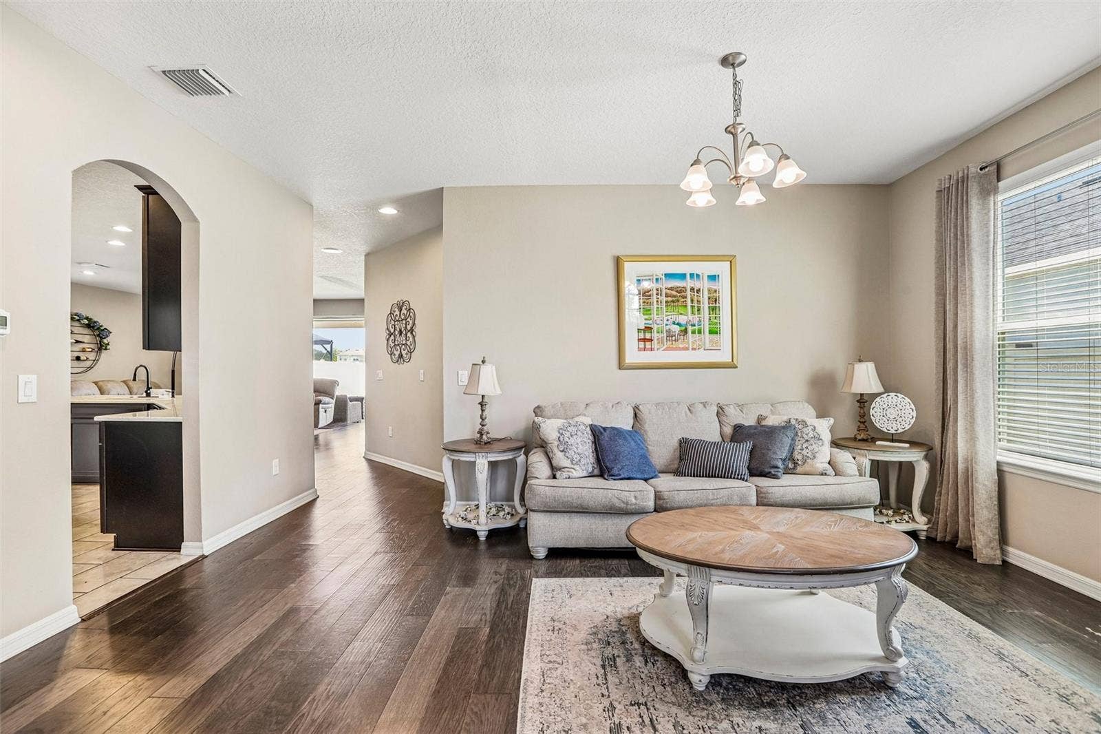 17628 BRIGHT WHEAT DRIVE, Lithia, FL 33547 Inviting Living Room with hard wood floors and neutral colors