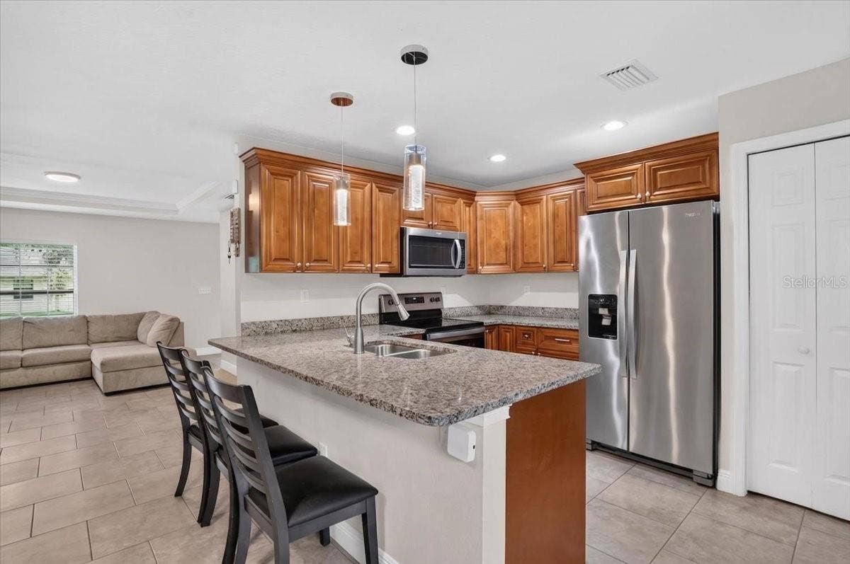 1607 E LINEBAUGH AVENUE, Tampa, FL 33612