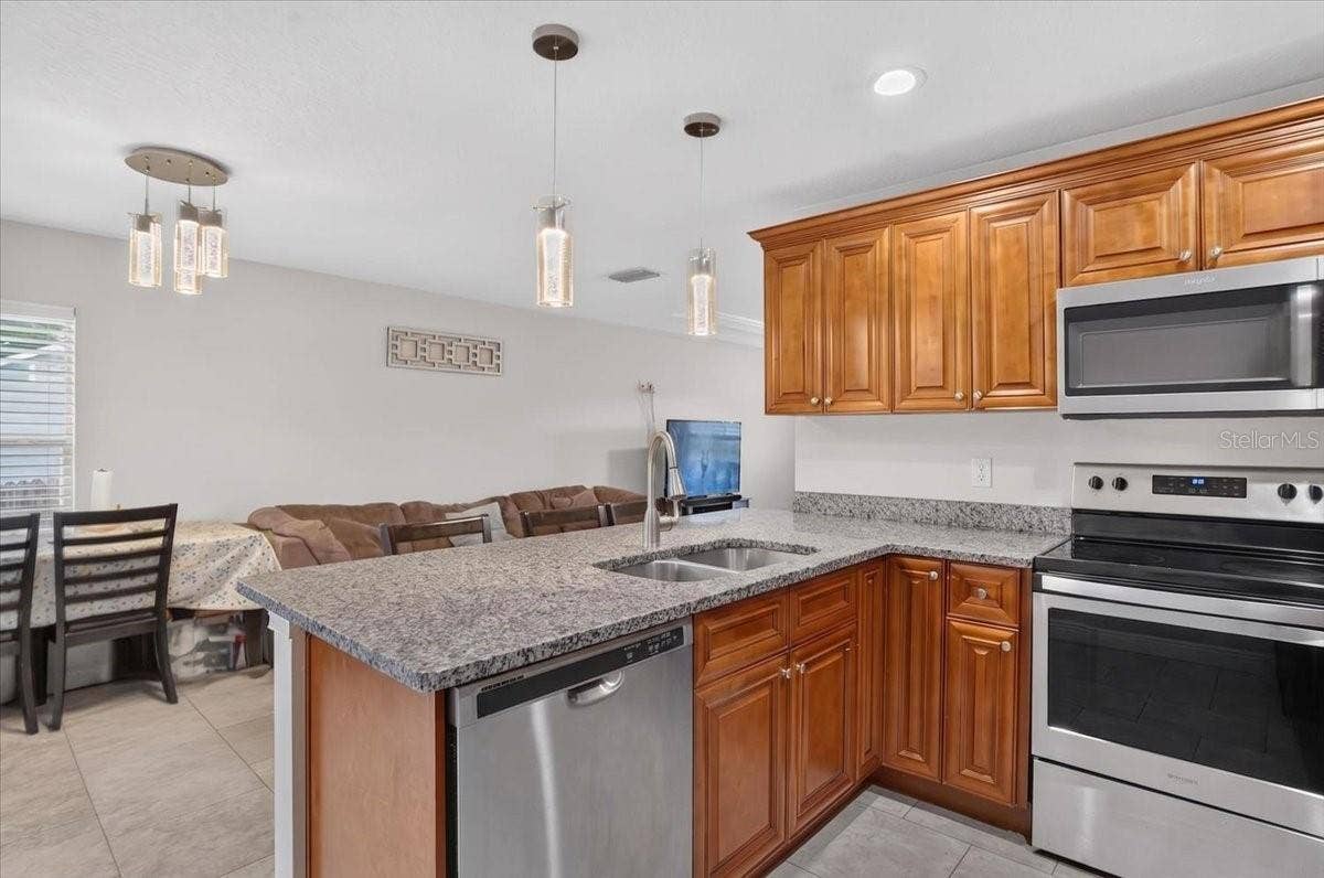 1607 E LINEBAUGH AVENUE, Tampa, FL 33612