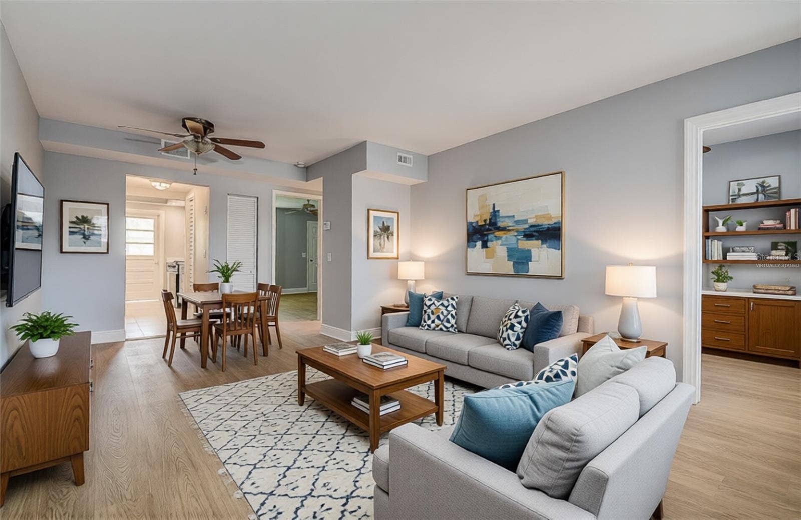 1819 SHORE DRIVE S, #110, South Pasadena, FL 33707 Virtually Staged Living Room/Dining Area