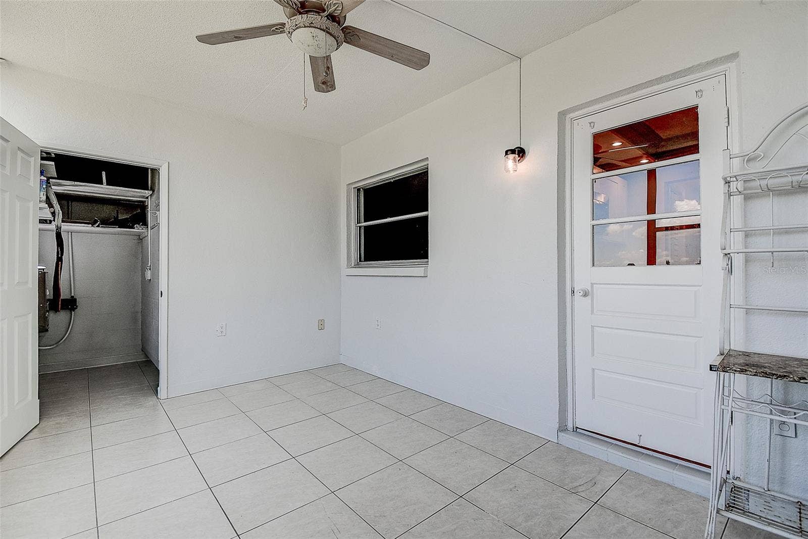1819 SHORE DRIVE S, #110, South Pasadena, FL 33707 Florida Room w/ Storage Closet