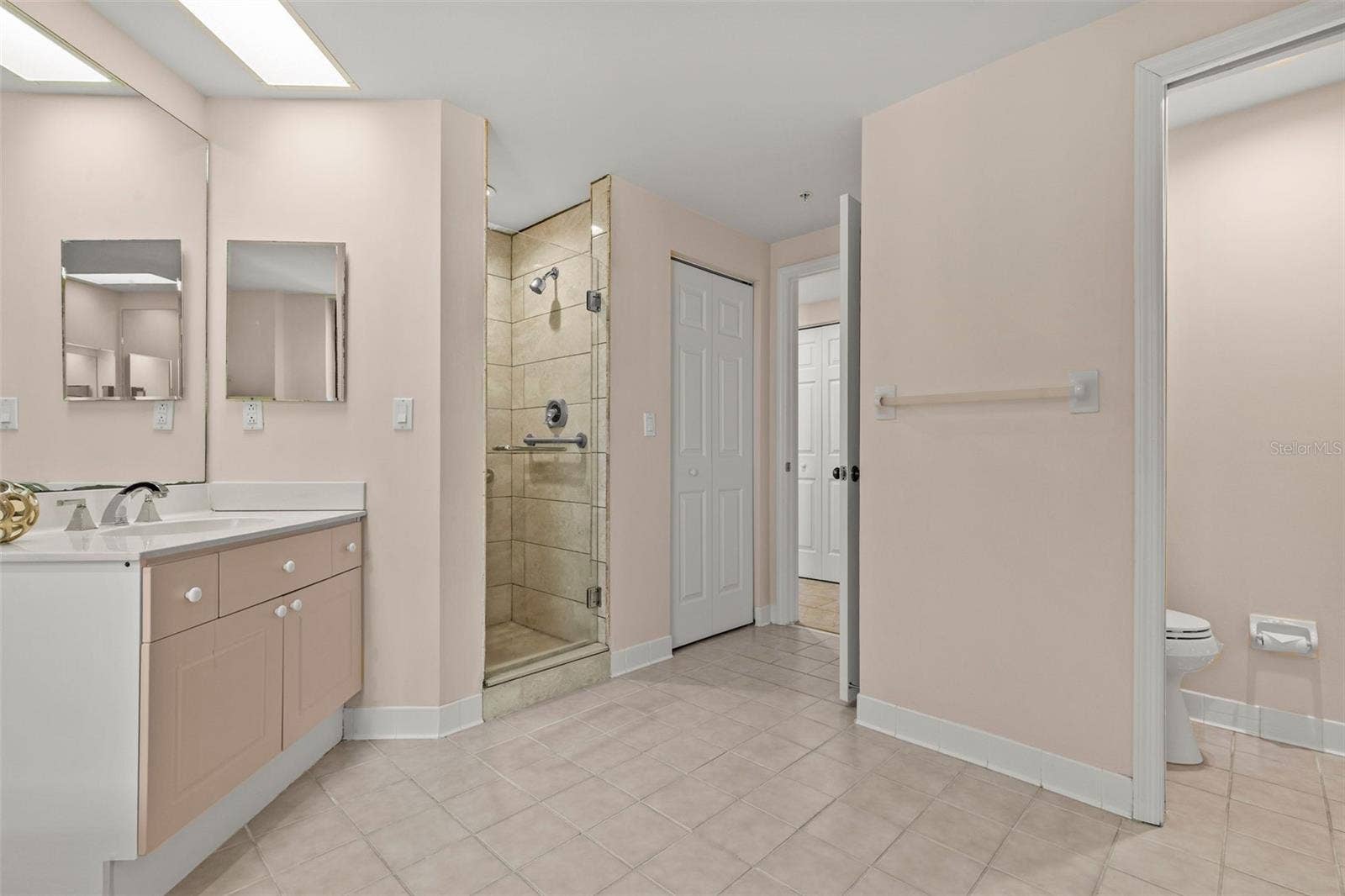 Primary Shower and private toilet area