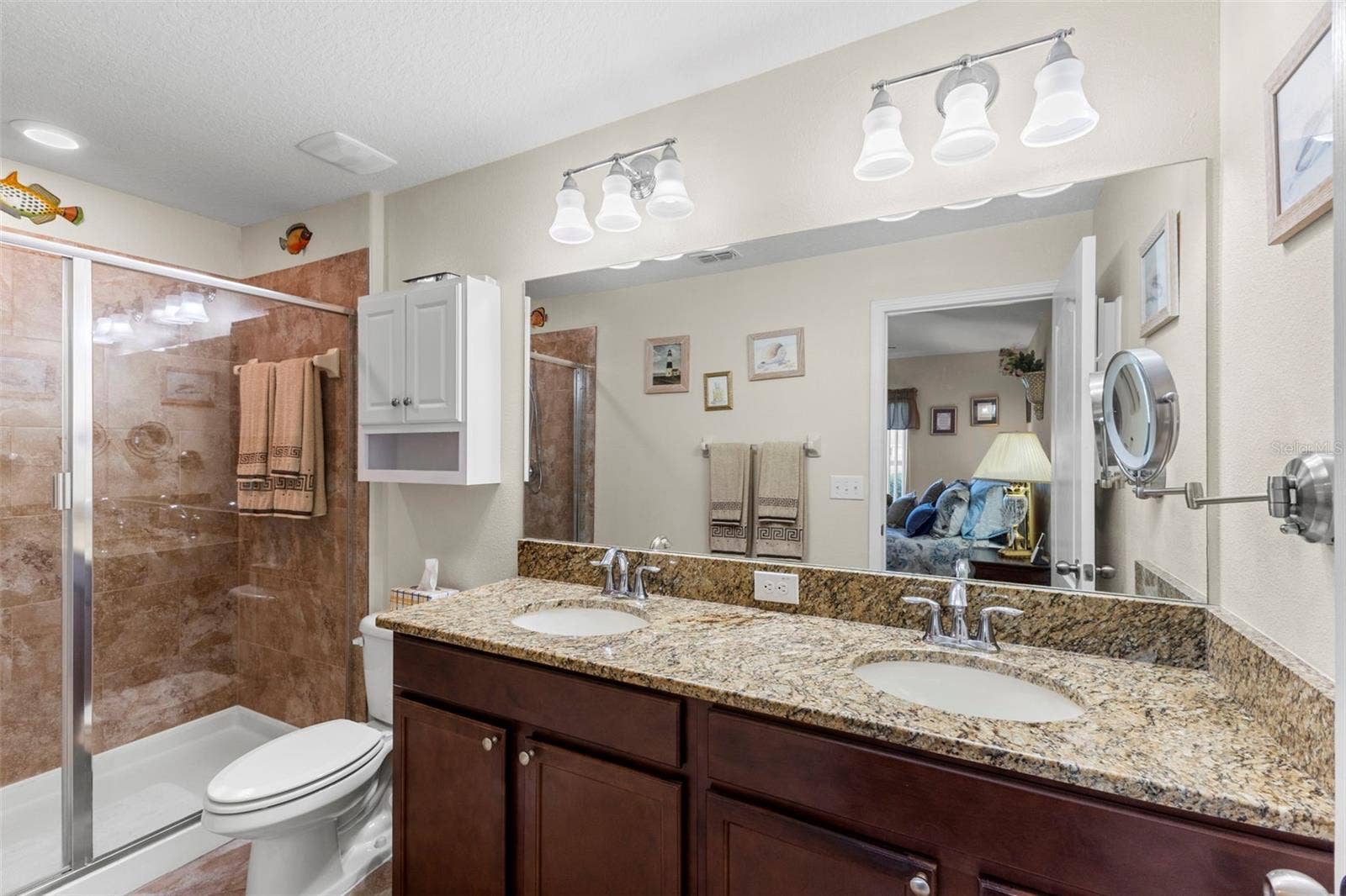 13627 CREST LAKE DRIVE, Hudson, FL 34669 Ensuite with dual vanity and step-in shower
