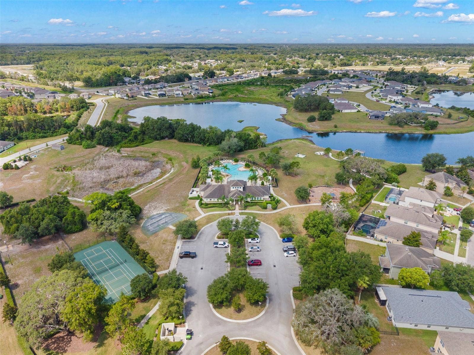13627 CREST LAKE DRIVE, Hudson, FL 34669 Community clubhouse, basketball court, tennis court, playground and pool
