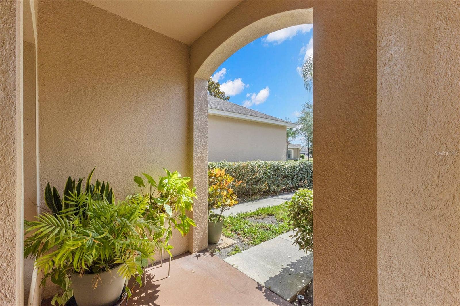 13627 CREST LAKE DRIVE, Hudson, FL 34669 Covered front door porch entry