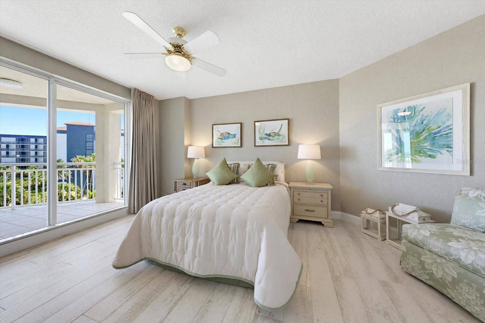 1170 GULF BOULEVARD, #404, Clearwater Beach, FL 33767 Primary suite furnished with queen size bed & well appointed furniture.