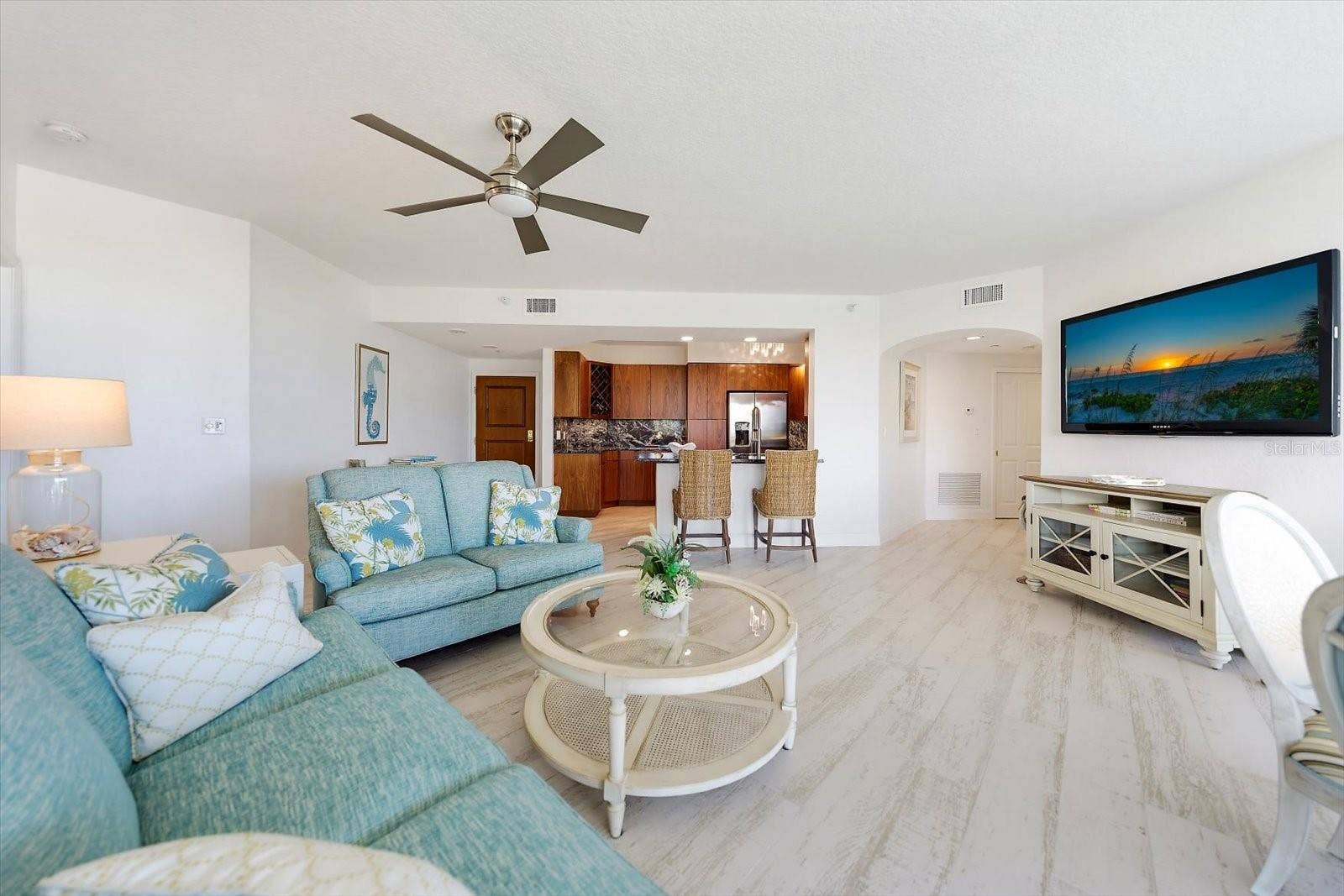1170 GULF BOULEVARD, #404, Clearwater Beach, FL 33767 Movie time is the perfect escape in this generous living room. Can you smell the popcorn popping?