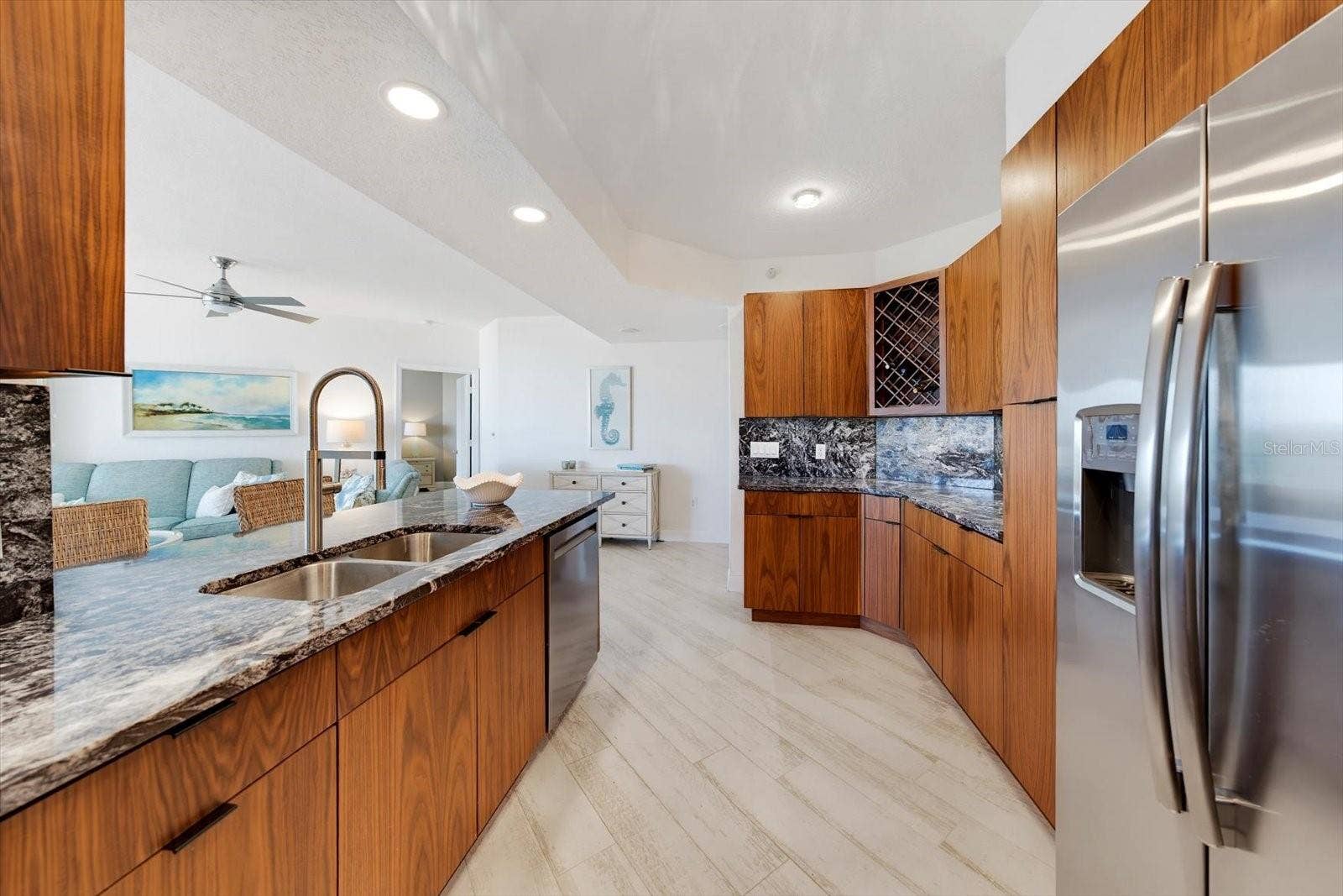 1170 GULF BOULEVARD, #404, Clearwater Beach, FL 33767 This kitchen is a chef's delight with stainless steel fridge featuring french doors & ice maker & topped off with the dishwasher ready to clean up the cookware.