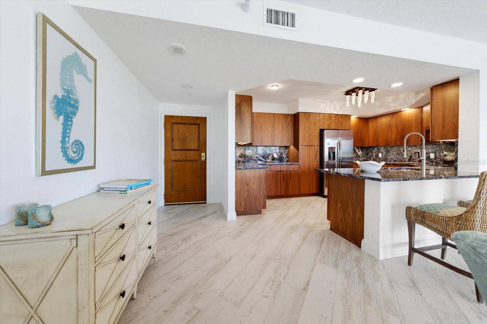 1170 GULF BOULEVARD, #404, Clearwater Beach, FL 33767 Entry provides direct access to not only the kitchen but the living room & dining room.