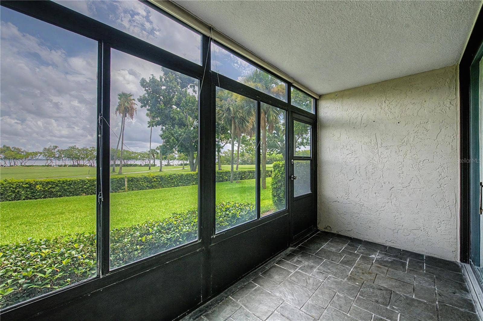 2618 COVE CAY DRIVE, #109, Clearwater, FL 33760 View of Tampa Bay and the Cove Cay fairway.