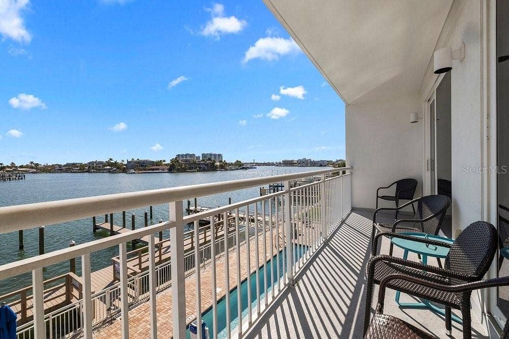 10091 GULF BOULEVARD, #203E, Treasure Island, FL 33706 Perfect waterfront balcony looking out to the intracoastal.