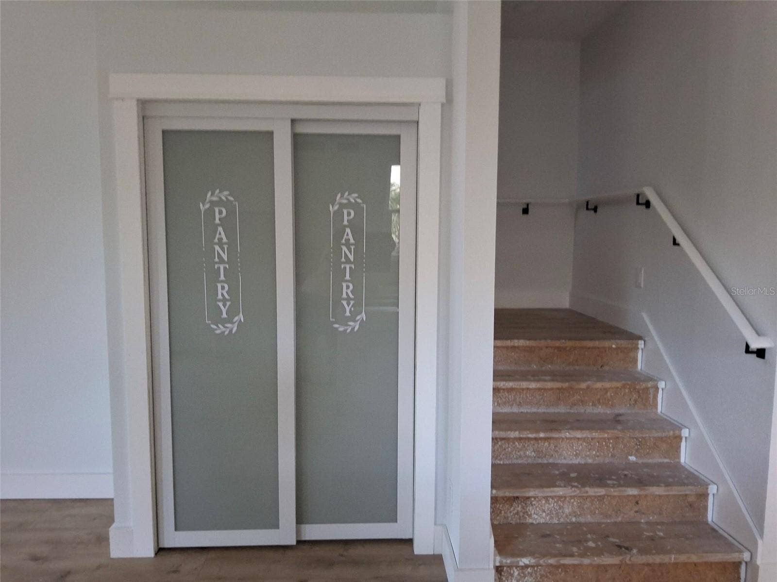 Large Kitchen pantry and staircase up to 2nd floor