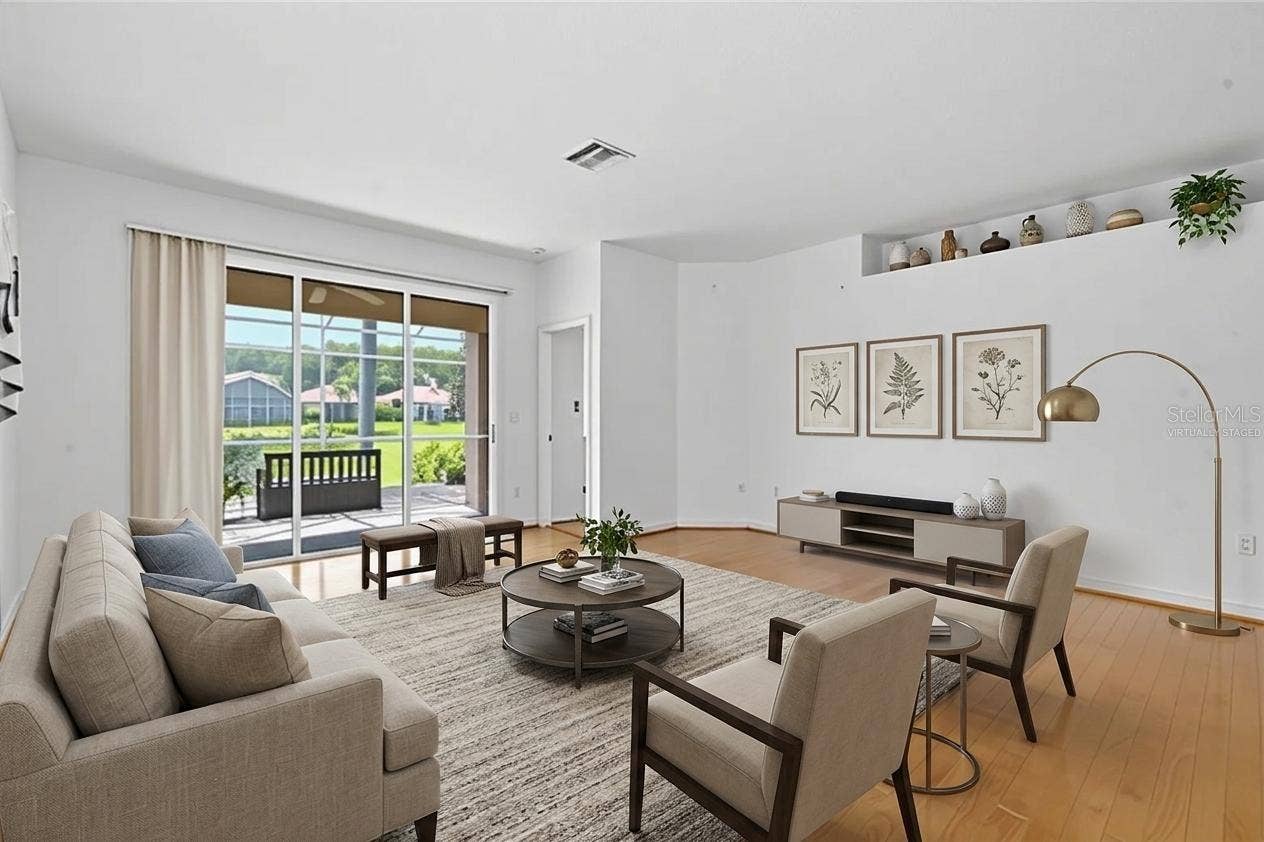 1333 LINDENWOOD DRIVE, Tarpon Springs, FL 34688 Living Room Virtually Staged