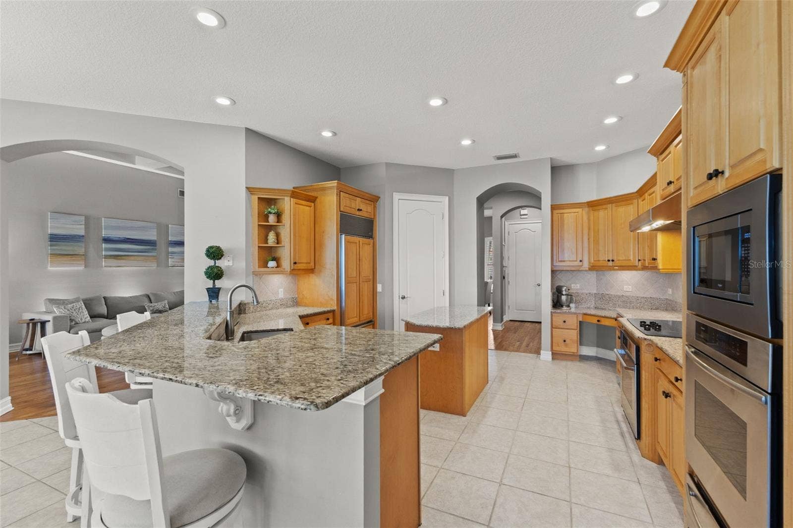 1105 3RD STREET E, Palmetto, FL 34221 Kitchen with solid wood cabinetry