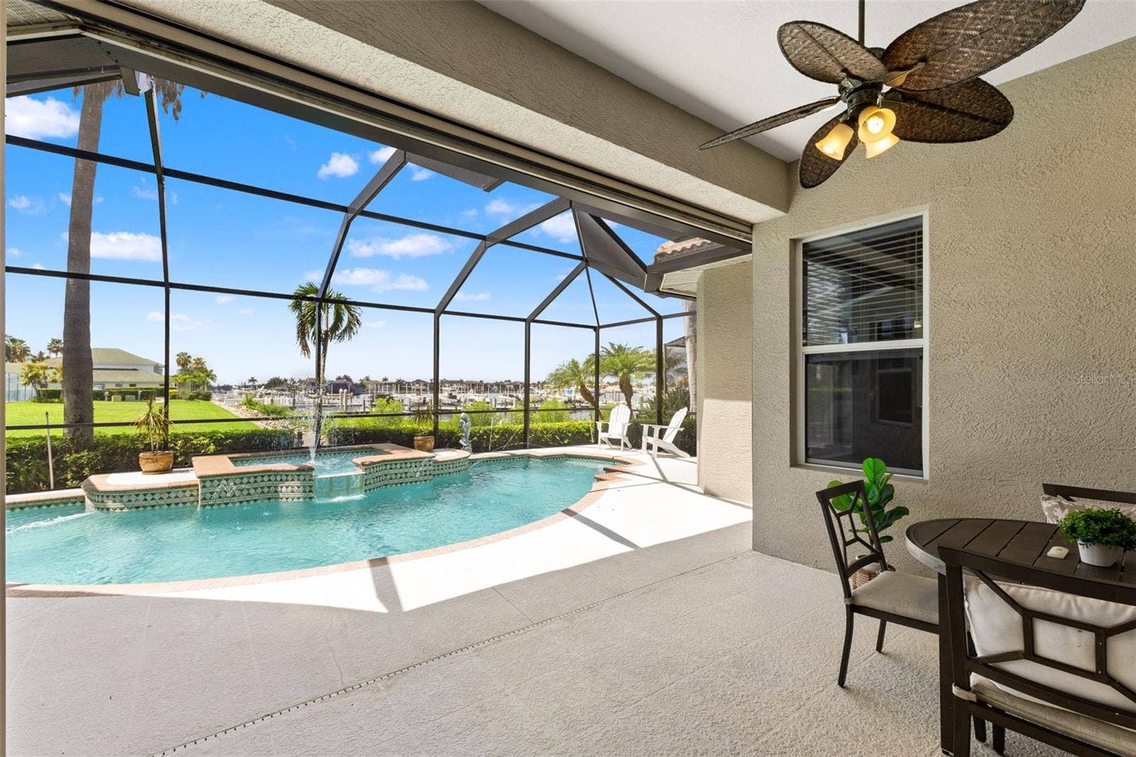 1105 3RD STREET E, Palmetto, FL 34221 Lanai with screened pool enclosure