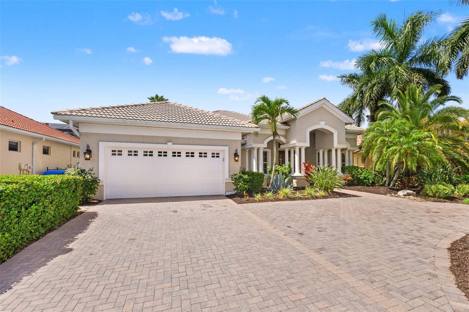 1105 3RD STREET E, Palmetto, FL 34221 Front elevation with pavered driveway