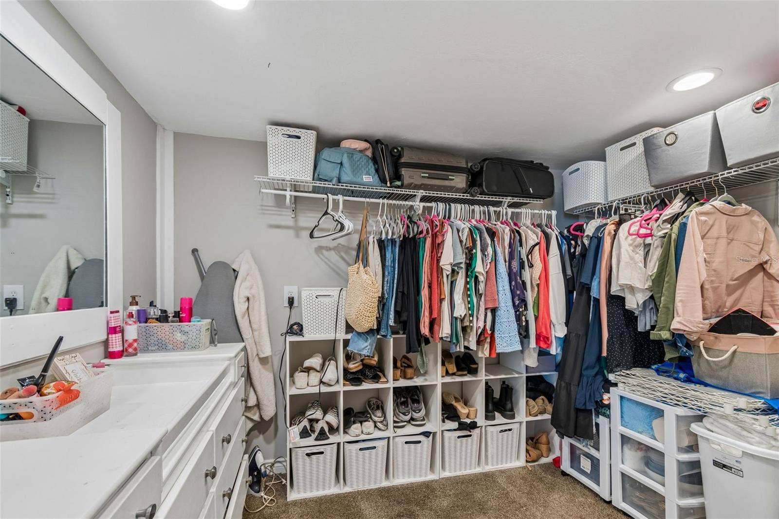 A spacious walk in closet adds even more storage to the oversized primary suite.
