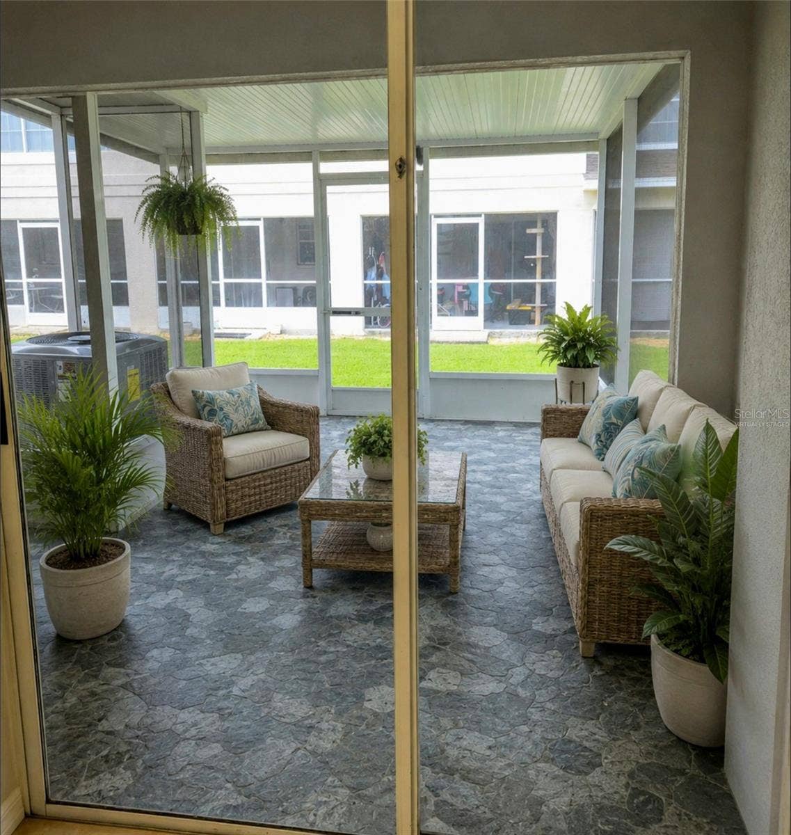 734 KENSINGTON LAKE CIR, #BRANDON, Brandon, FL 33511 Virtually Staged Screened Lanai