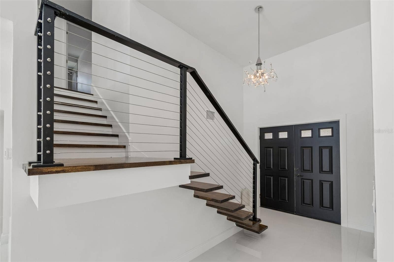 775 CAPRI BOULEVARD, Treasure Island, FL 33706 Vaulted ceiling create a grand entrance